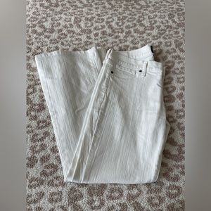 In great condition, flare white jeans, like new